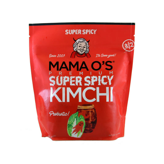 Mama Os Premium Kimchi’s Super Spicy Kimchi comes in a red pack with a cartoon woman logo, “super spicy” text with ghost pepper highlights, and kimchi and cabbage illustrations—packed with probiotics for bold flavor.