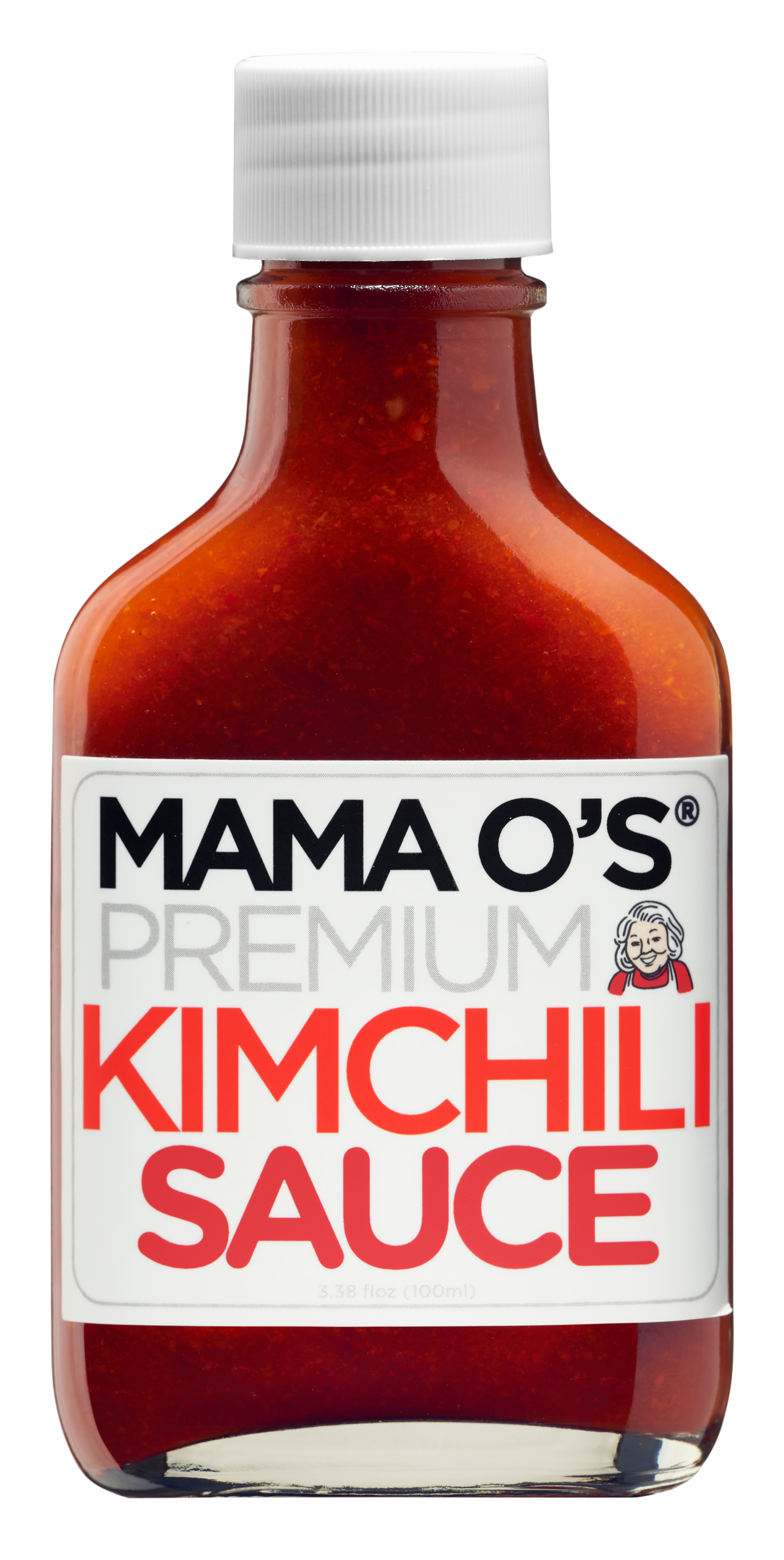 A bottle of Mama O’s Premium Kimchili Sauce with a white cap and a label displaying the brand name and product in bold black, silver, and red text. The sauce inside is bright red.